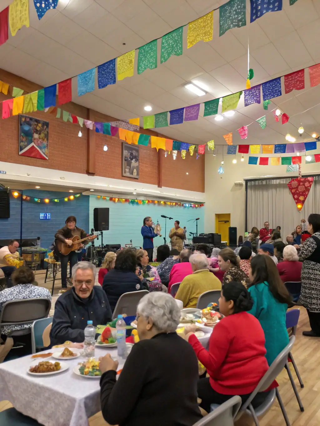 A photo of a community event held at the chapel, with people of all ages participating in a cultural activity or historical presentation.
